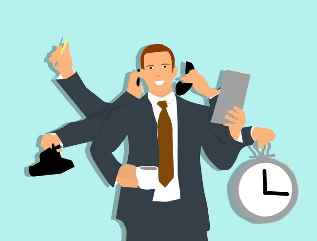 multi-tasking Picture of man multi-tasking against the clock