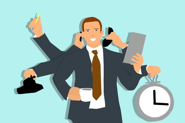 multi-tasking Picture of man multi-tasking against the clock